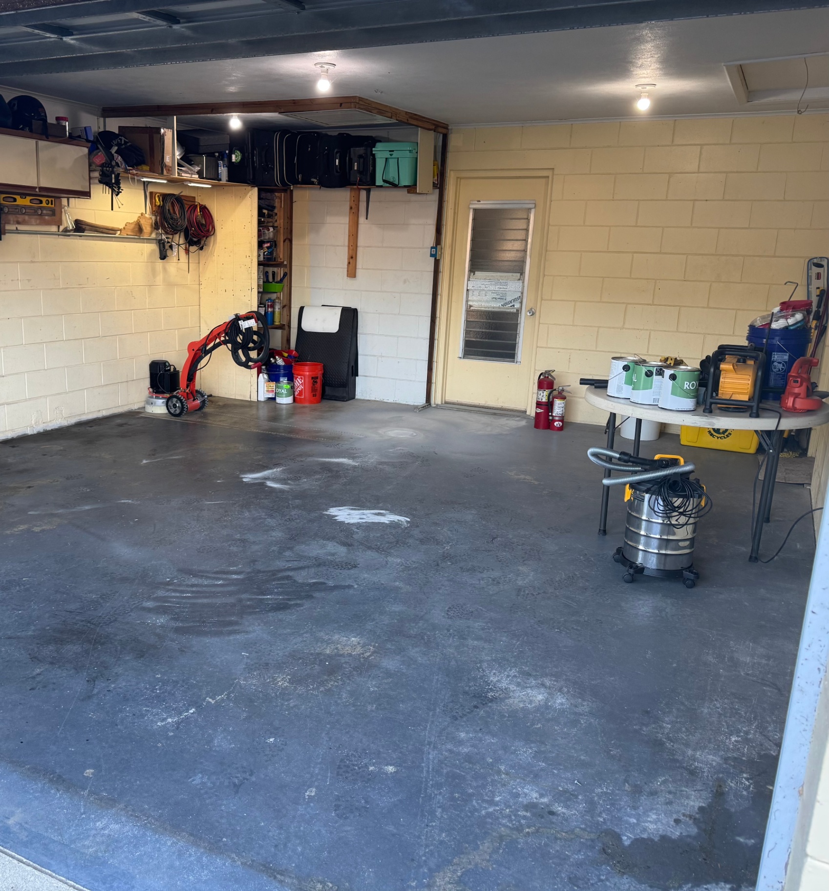 Bare concrete garage floor before coating